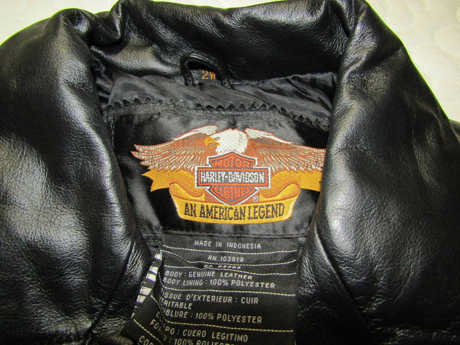 Women HD Leathe Coat: Size 2W womens Harley Davidson Leather Embroidered patches on it