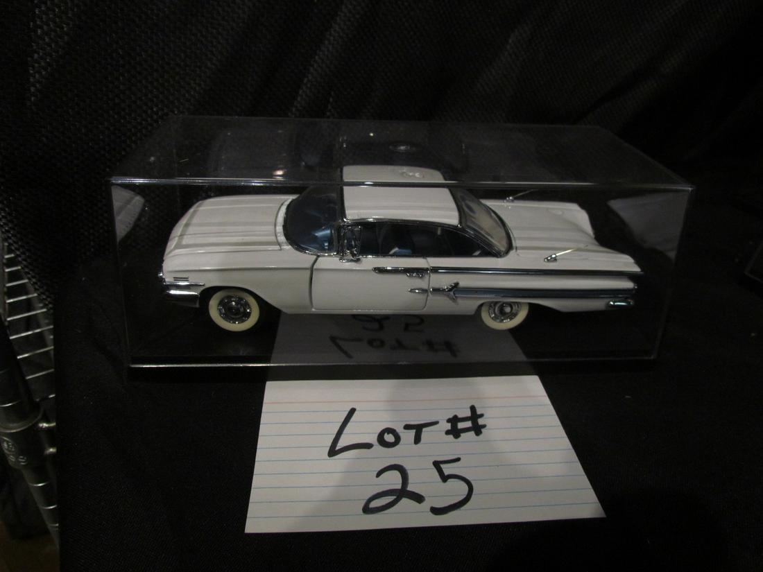 Franklin Mint 1960 Chevy Impala: this is a very nice Franklin Mint 1960 Chevy Impala In Good shape no box but has showcase