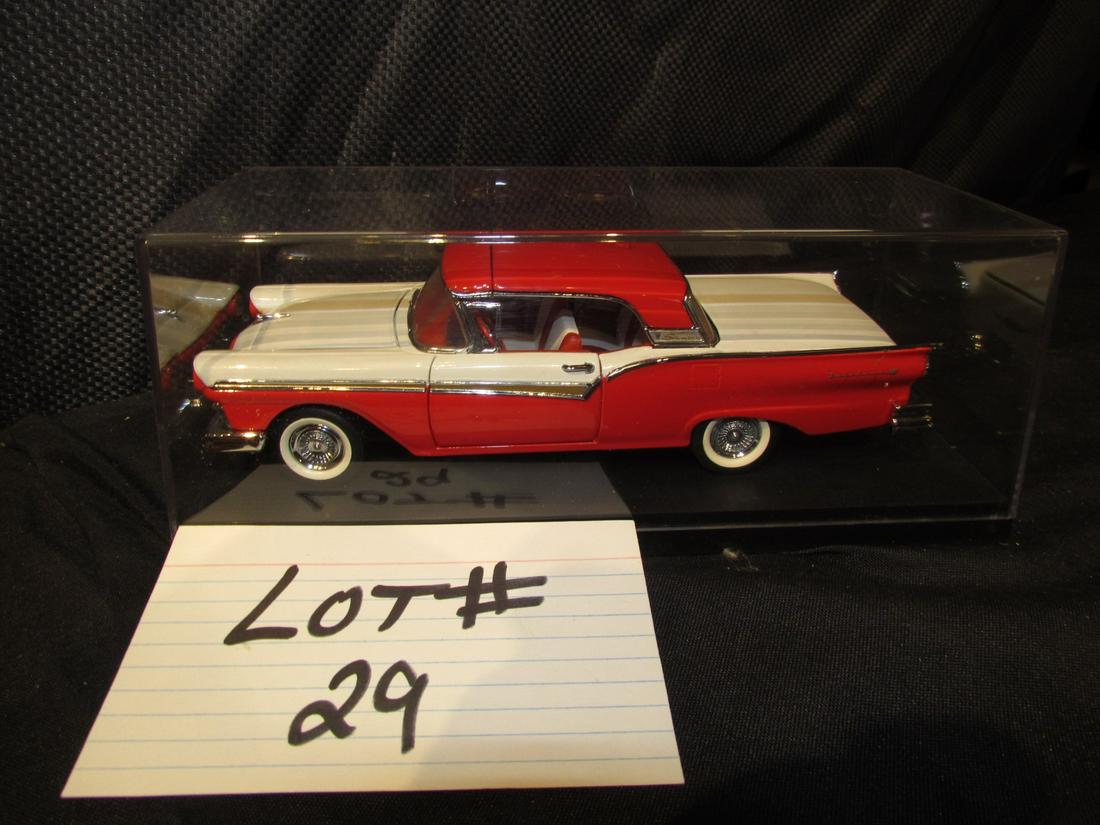 1957 Franklin Mint Ford Fairlane 500: this is a nice 1957 Ford Fairlane 500 Hard top Convertible red and white no box has shocase