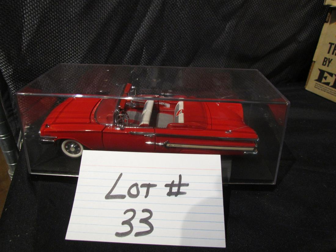 Franklin Mint 1960 Chevy Impala: this is a nice 1960 Chevy Impala Convertible red percsion model