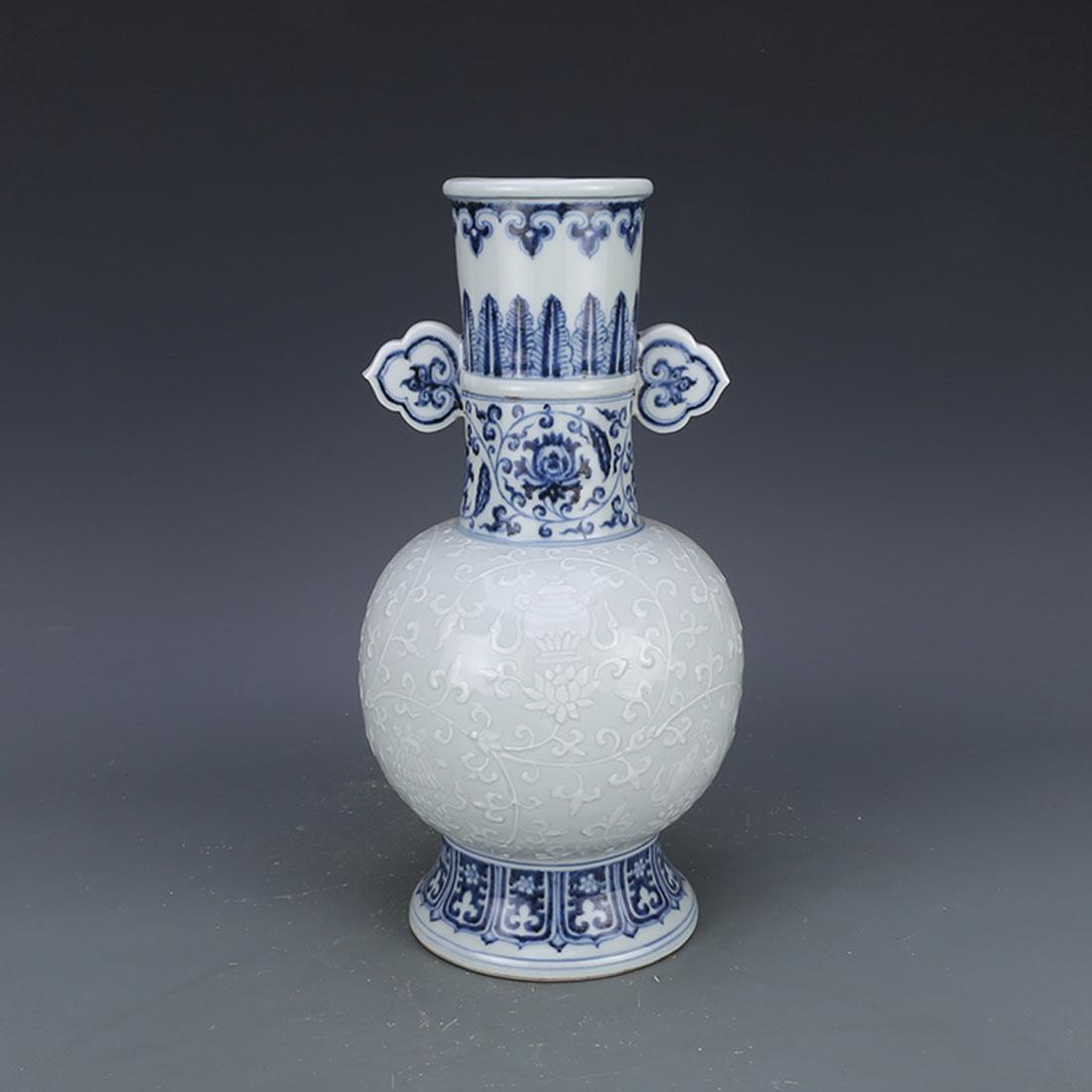 Ming Dynasty Embossed White and Blue Porcelain Vase: Embossed White and Blue Porcelain Vase w Double Ears and Xuande Mark