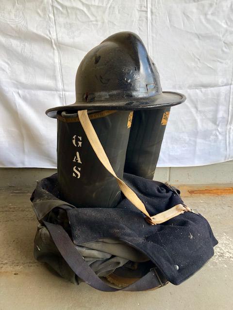 Vintage Fireman's Boots Pants & Helmet Lot: Vintage Fireman's Boots Pants & Helmet Lot. From the estate of the firefighter himself. Top Notch Siren Boots, Helmet, & Navy Contract Overalls. As-found and as-shown. Firefighter initials painted on