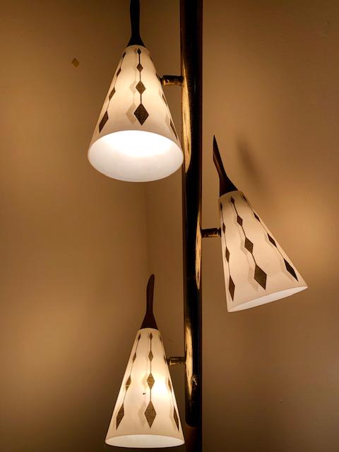 Mid-Century Three Lamp Pole Light: Mid-Century Three Lamp Pole Light. Spring-loaded. Three lights, three position switch- works. Signs of wear/age. Goes floor to ceiling.