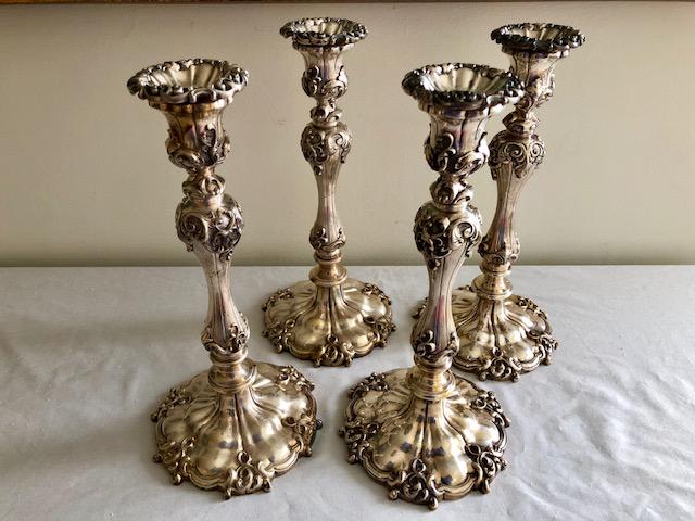 Elkington & Co English Silverplate Candlestick Set of 4: Elkington & Co Ornate English Silverplate Candlestick Set of 4. 12-inches High by 9-inch Diameter Base.