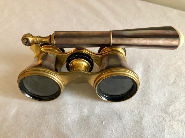Purple Mother of Pearl Opera Glasses w/Handle: Antique Purple Mother of Pearl Opera Glasses w/Handle. 1 1/4-inch Diameter Lenses; 5-inch Handle. Great Estate Condition!