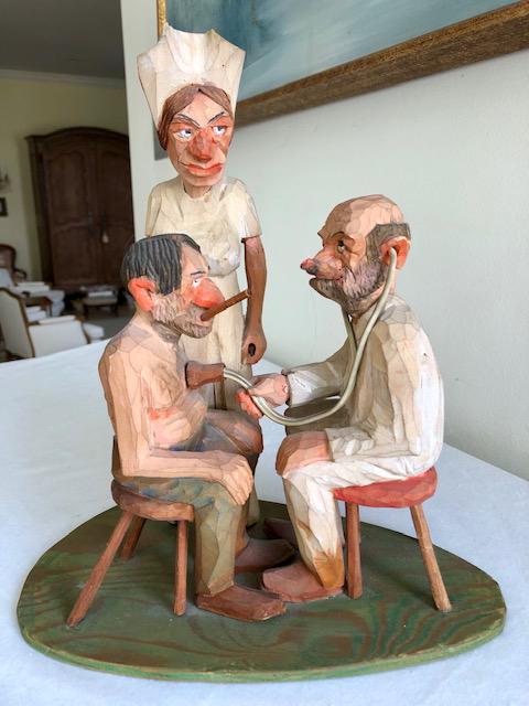 Gene Zesch Custom Wood Sculpture Group: Gene Zesch Custom Wood Sculpture Group. Doctor, Nurse and Patient. 10-inches by 11-inches High. 10-inch by 6-inch Base. Signed Piece.