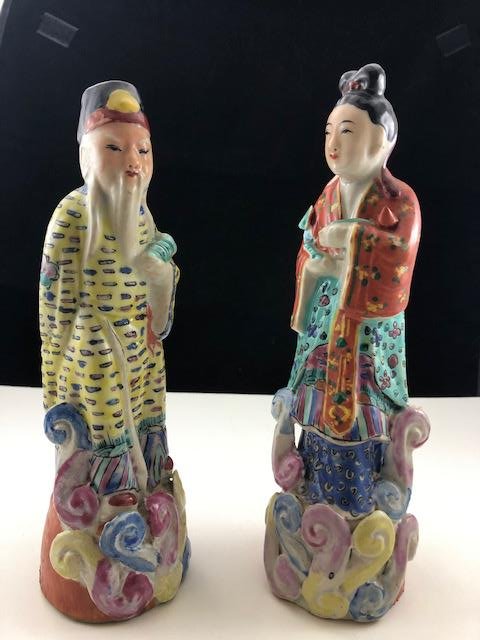 Chinese Porcelain Ceramic Enamel Figurines Set: Chinese Porcelain Ceramic Enamel Figurines Set of Two, 8-Inches High, 2 3/8-inch Diameter Base. In good estate condition, note all pictures. Made in China.