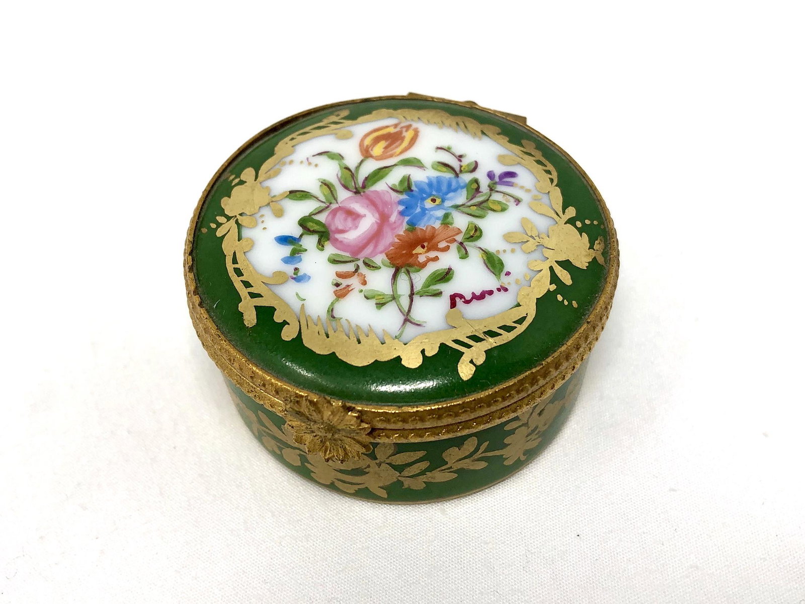 Limoges France Peint Main Paris Style Trinket Box: Limoges France Peint Main Paris Style Trinket Box. 2-inch Diameter by 1-inch Height. Handpainted. As-is, as-shown.
