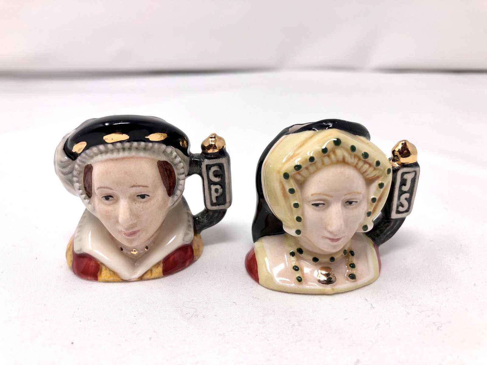 Royal Doulton Mini Toby Mug Pair Jayne Seymour: Royal Doulton Mini Toby Mug Pair Jayne Seymour Catherine Parr. D 7043 7046. Each approx. 1 3/4-inches tall.