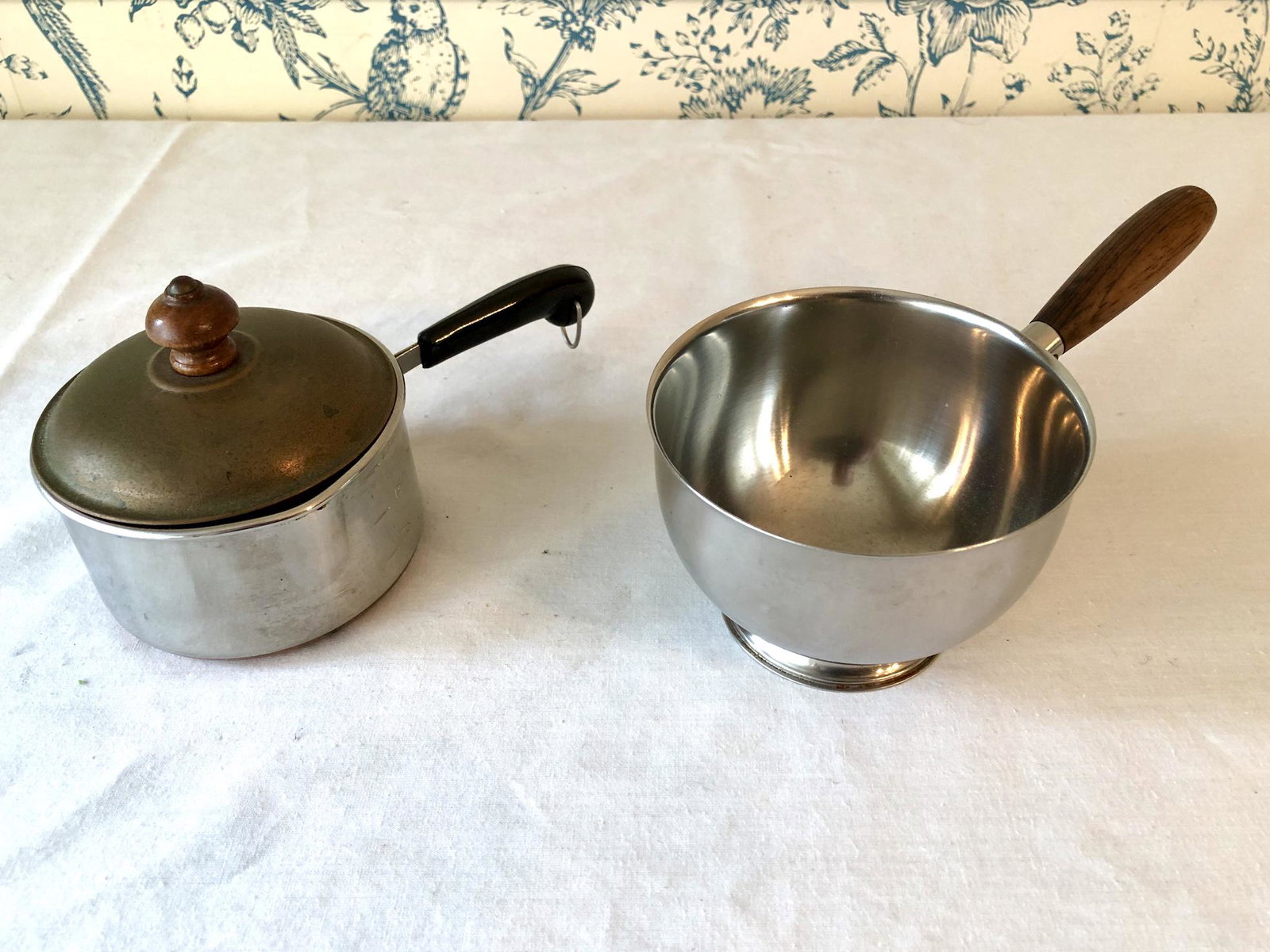 Vintage Copper Bottom 1 Cup Pot Danish Sauce Pot Lot of: Vintage 1-Cup Copper Bottom Paul Revere Ware Pot and Danish Wood Handled Stainless Sauce Pot. 3 1/2 to 3 3/4-inch Diameters by 2 to 2 1/4-inches Tall. As-Is, As-Shown from an estate. In vintage, as-fo