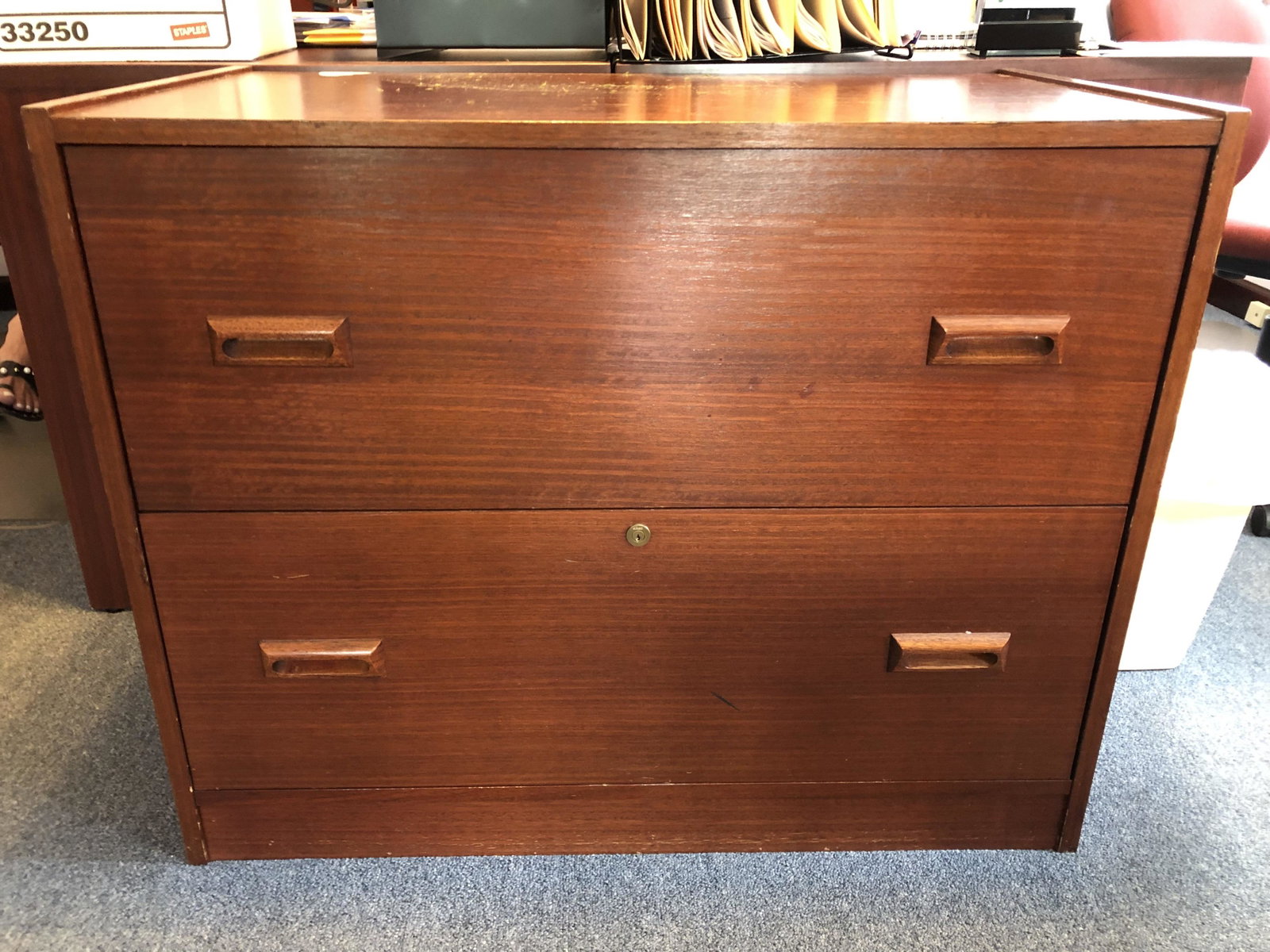 Laminate Wood Filing Cabinet Chest: 36 by 19 1/2 by 29-inches Tall, As-is. This lot is for one cabinet. Items or other objects may be in the picture or on top of, inside the featured lot but they are not included.