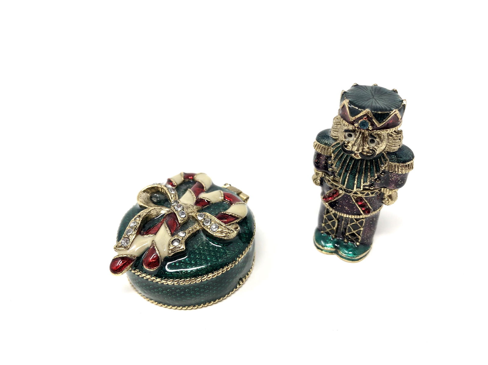 Monet Christmas Themed Enameled Bejeweled Trinket Boxes: Monet Christmas Themed Enameled Bejeweled Trinket Boxes Lot of 2. Marked Monet. Nut Cracker/Toy Soldier and Candy Cane Ribbon Trinket Box. Collectible Miniatures. All In beautiful as-is, as-shown coll
