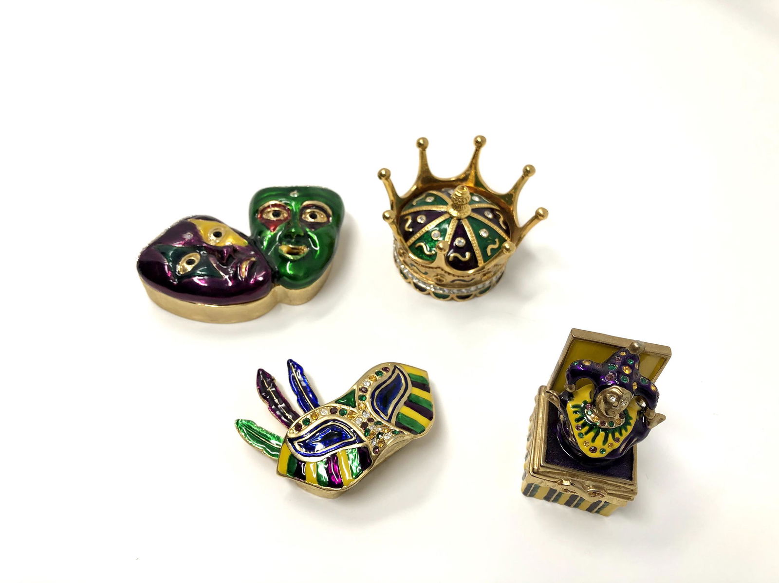Enameled Bejeweled Trinket Boxes Lot of 4: Enameled Bejeweled Trinket Boxes Lot of 4. Not Branded. Masquerade Masks, Royal Crown, Jester Jack in the Box, Etc. Collectible Miniatures. All In beautiful as-is, as-shown collector condition. Please