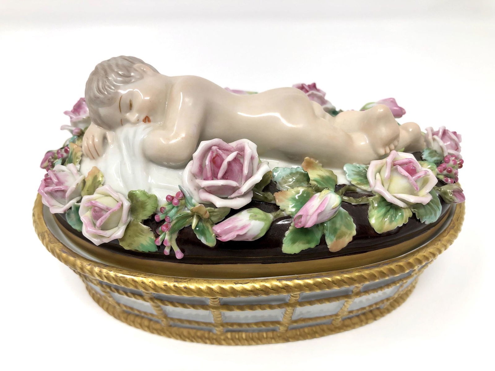 Capodimonte Porcelain Baby On Bed of Roses Nesting: Capodimonte Porcelain Baby On Bed of Roses Nesting Fairing Box. Marked, Stamped, Signed. Approx. 3 1/2-inches Tall by 3 1/2 by 6-inches In Overall Dimension. In beautiful as-is, as-shown collector con