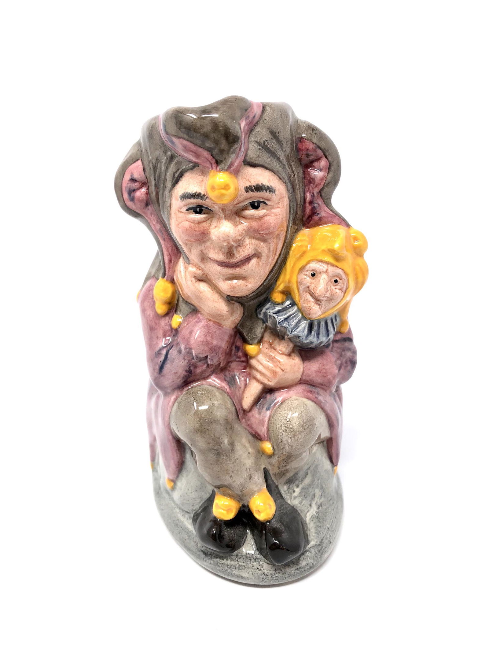 Royal Doulton England The Jester D 6910 Limited Edition: Royal Doulton England The Jester D 6910 Limited Edition of 2500 Toby Mug. Approx. 5 1/2-inches Tall by 3 1/4 by 2 1/2-inches wide. In beautiful as-is, as-shown collector condition. Please note all pho