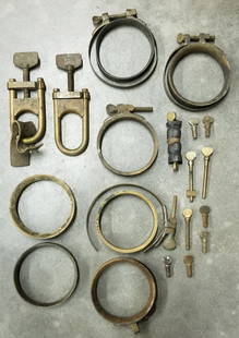 Brass Diving Suit Wrist Clamps & Browne Suit Clamps: Total of 19 pieces. Lot has 4 complete Browne suit clamps - one is marked DESCO. There is also diving suit wrist clamps in various stages of condition and completeness. One clamp ring is marked A.
