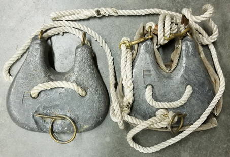 Vintage Divers Lead Chest Weights Front & Back: This is a pair of divers lead weights. This style was used on the front and back of the chest. Brass hardware intact along with rope. One of the weights does have leather on the backside. Both