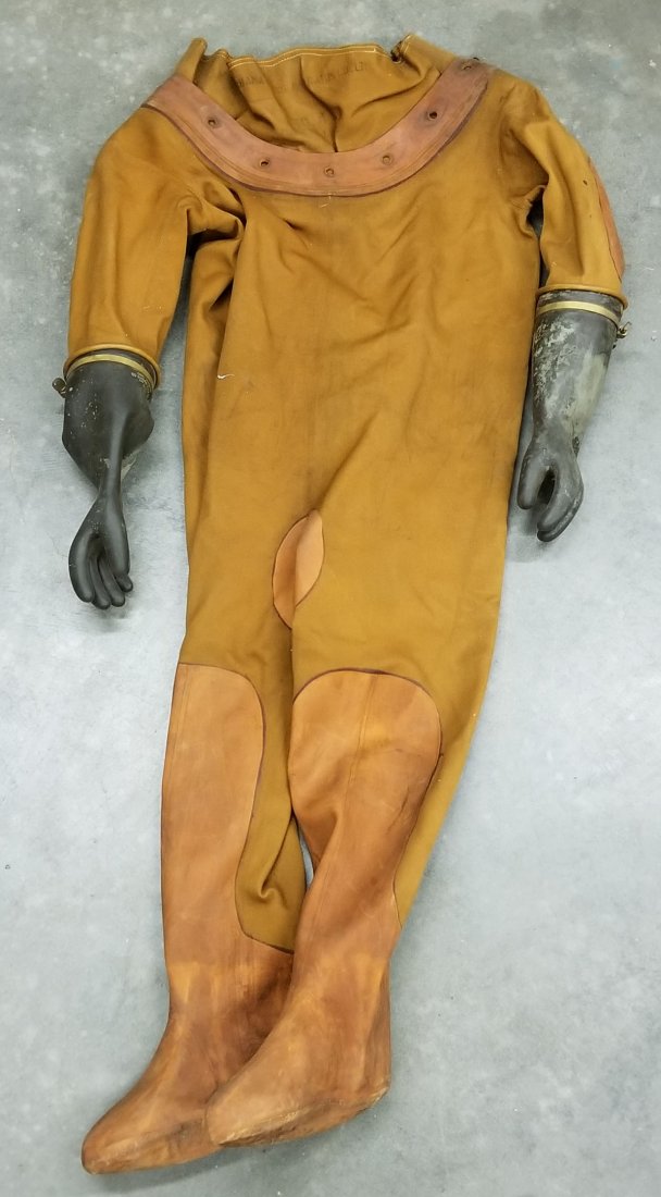 Vintage Yokohama Diving Suit 12 Bolt Pattern Size 4: This is a vintage Yokohama Diving Dress or suit. The suit is used and is punched for a standard 12 bolt pattern Yokohama helmet. Size No. 4. The suit is used but still in very presentable condition fo