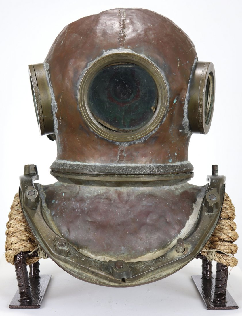 Chilean 3 Light 12 Bolt Antique Diving Helmet: This is a fairly unusual and interesting antique diving helmet made in the Republic of Chile. While we can not place a firm date of manufacturer on this helmet, mid-20th Century is a good estimate. Th