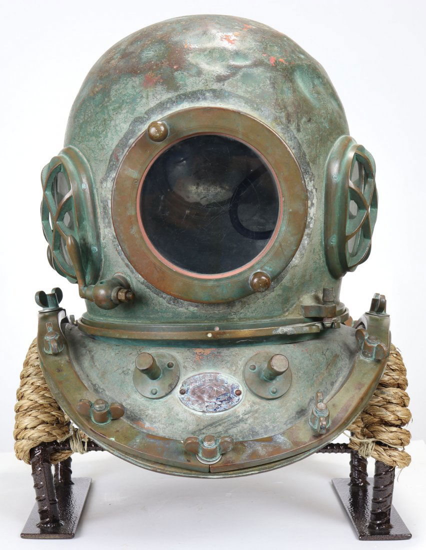 TOA Diving Apparatus Japan Antique Diving Helmet: Direct from Tokyo Japan is this classic helmet made by the TOA Diving Apparatus Company. A large majority of these helmets generally are completely used up before being discarded or entering the colle