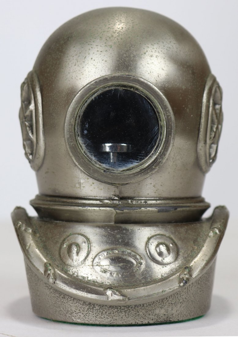 Vintage Desk Top Diving Helmet Lighter / Siebe Gorman?: Wonderfully detailed metal diving helmet desk lighter! This piece measures 3.5 inches tall and 2.5 inches wide. The top half (bonnet) can be removed to reveal the lighter. Bottom features green felt. 