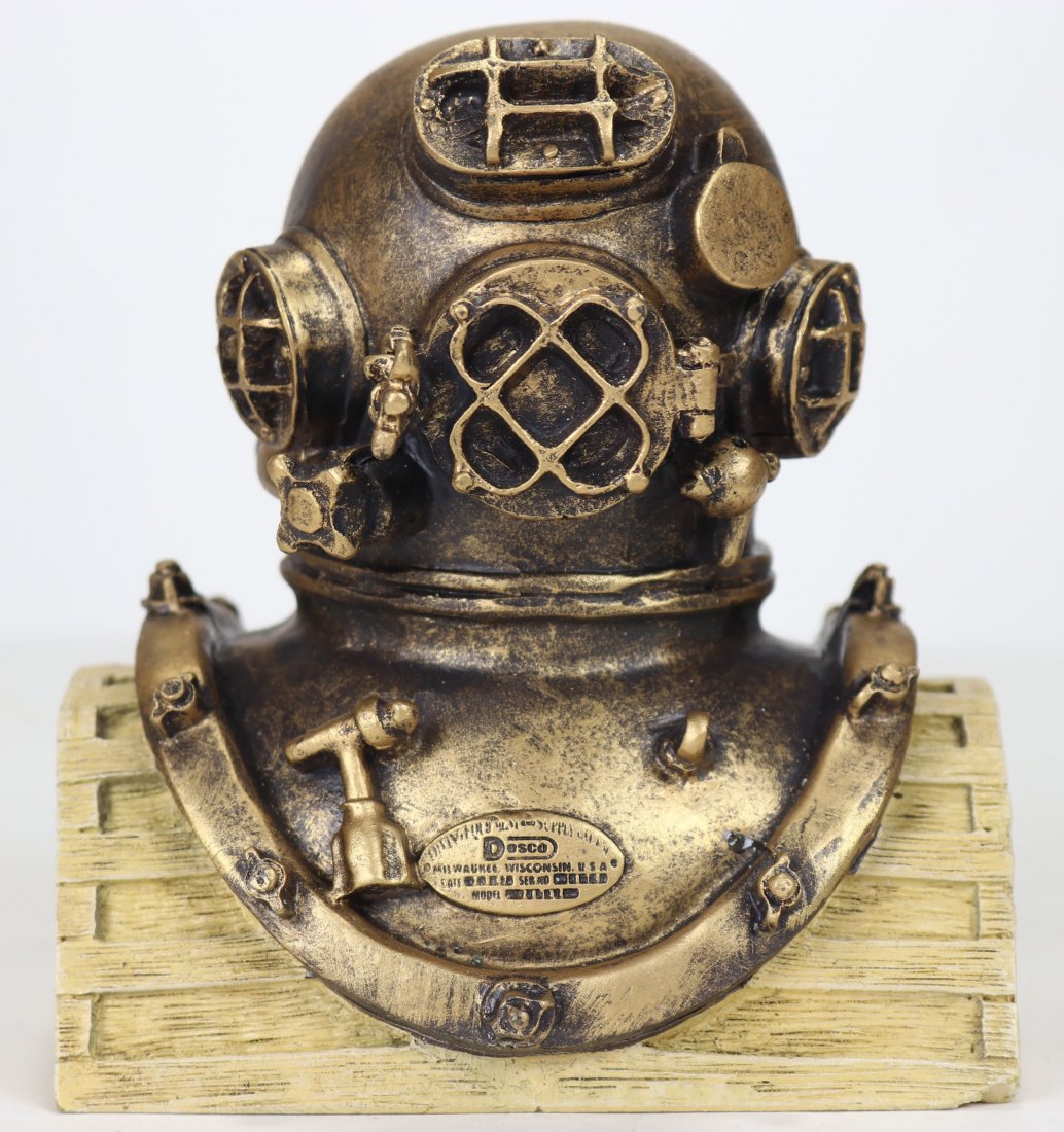 Detailed DESCO Navy Mark V Diving Helmet Display Model: Very detailed model or desk display of a DESCO US Navy Mark V diving helmet. This piece appears to be made of a very hard type resin. Measuring 4 inches tall and 3-3/8 inches wide, this appears to be