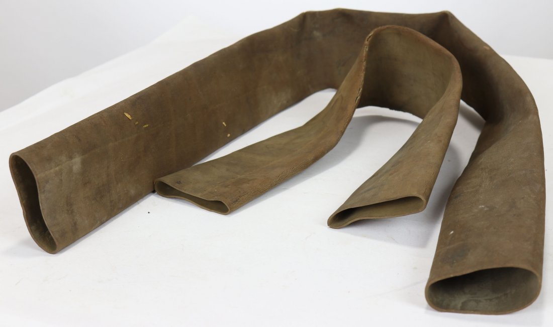 Old Snap Tubing Hose For Divers Wrists Unused: At first sight this may not seem like anything, but it is. This is two lengths of rubber snap tubing. A diver would buy this material in 3 foot lengths and cut off a small section. Acting like a rubbe