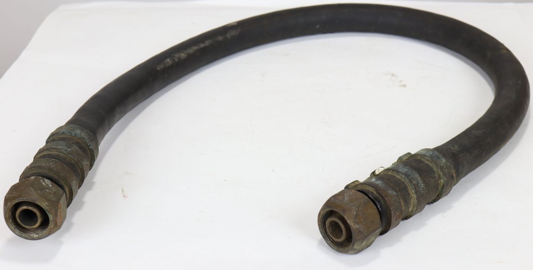 Mark V Diving Helmet Air Supply Whip WW2 Era Navy Stamp: Nice World War 2 era whip that would attached to a Mark V or even commercial style helmets. A number of these were made during World War 2 to support the use of the Mark V helmets. This ship retains t
