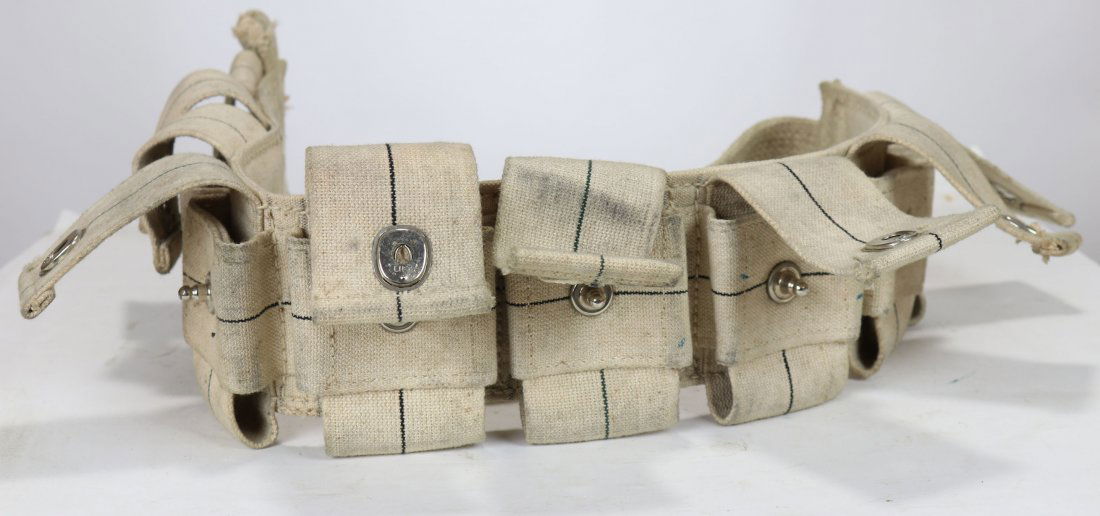 WWII Surplus Ammo Belt Used For Diving Weight Belt: Likely WWII surplus – these ammunition belts were used as weight belts by divers. Some kits with shallow water diving masks would be equipped with these belts. They are easy to take weight in and ou