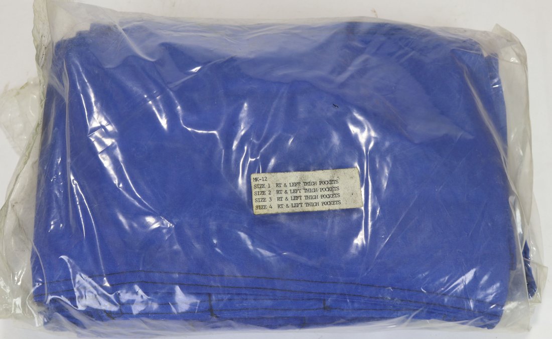 US Navy Mark 12 Dive Suit Right & Left Thigh Pockets: US Navy Mark 12 diving suit right and left thigh pockets. This is a new old stock sealed package containing size 1, 2, 3 and 4 pockets. All items will be shipped with a signature required upon deliver