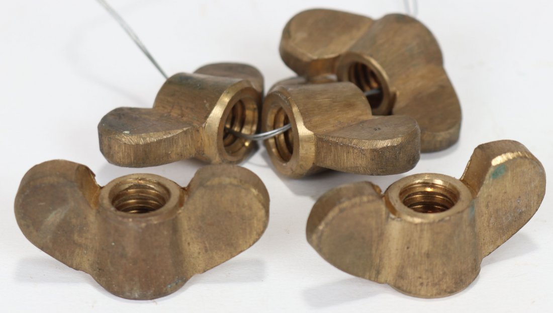 Wing Nuts For Asian Style Diving Helmet 5 New Old Stock: This is a grouping of 5 new old stock (unused) wing nuts that will fit most Asian made diving helmets. These have been in the inventory of a now closed dive company for decades.