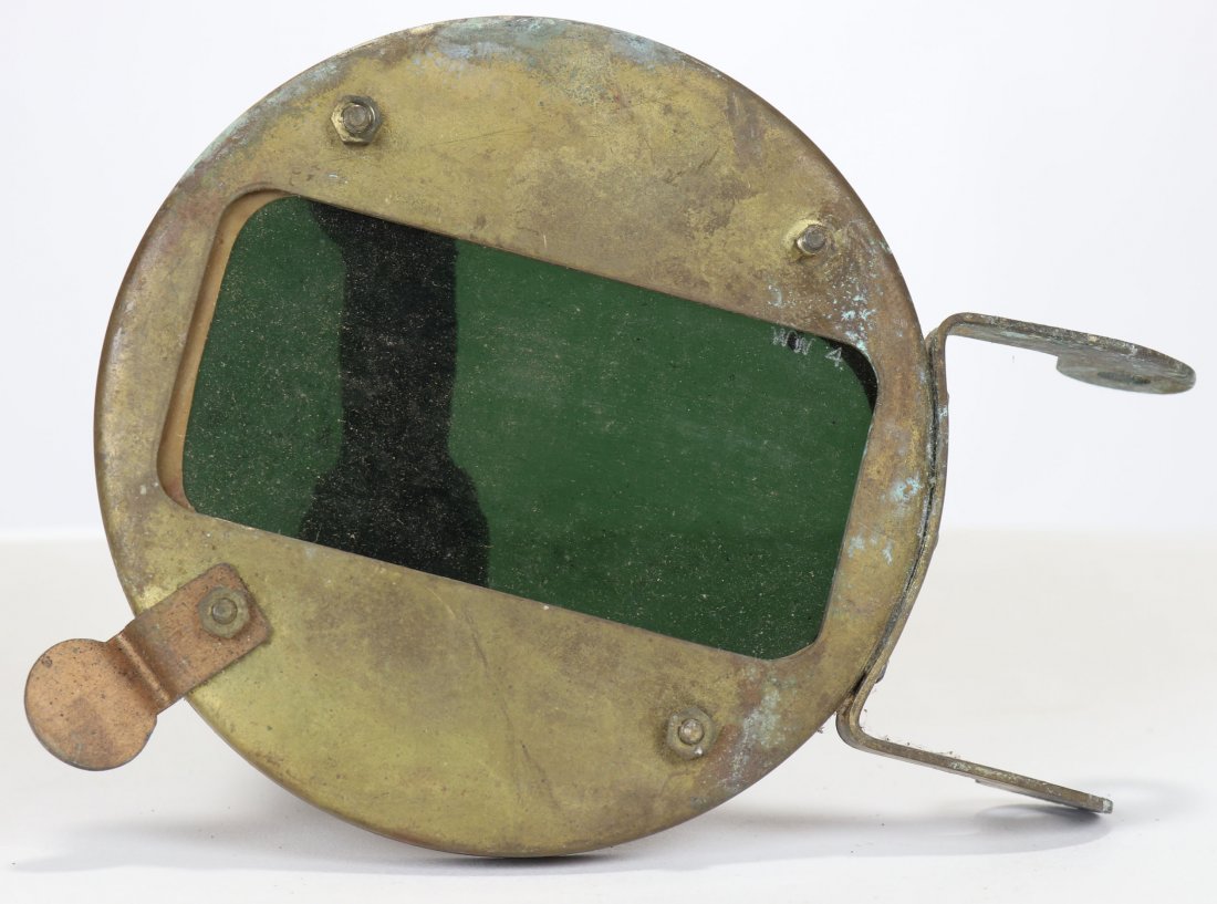 US Navy Mark V Diving Helmet Welding Lens: Difficult to find welding lens made for use on the US Navy Mark V diving helmet. Excellent original condition including copper tab and window. This piece is installed easily by removing the hinge pin 