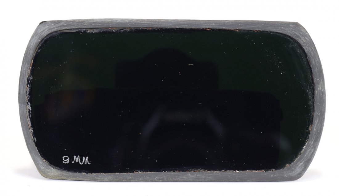 New Welding Lens Glass For US Navy Mark V Diving Helmet: Virtually impossible to find new old stock Mark V welding lens glass. Glass easily installs into brass welding shield for the US Navy Mark V diving helmet.