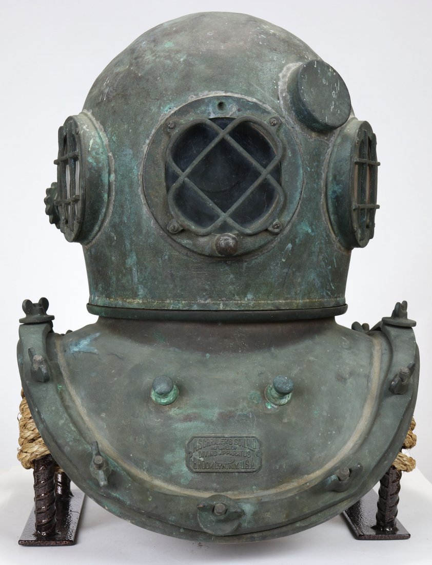 A Schraders Son 1940s Diving Helmet w/ Great History: Wonderful as found original A. Schraders Son diving helmet. This helmet along with the Craftsweld helmet (lot 76) were found together. Both helmets were owned & used by the Construction Aggregate Comp