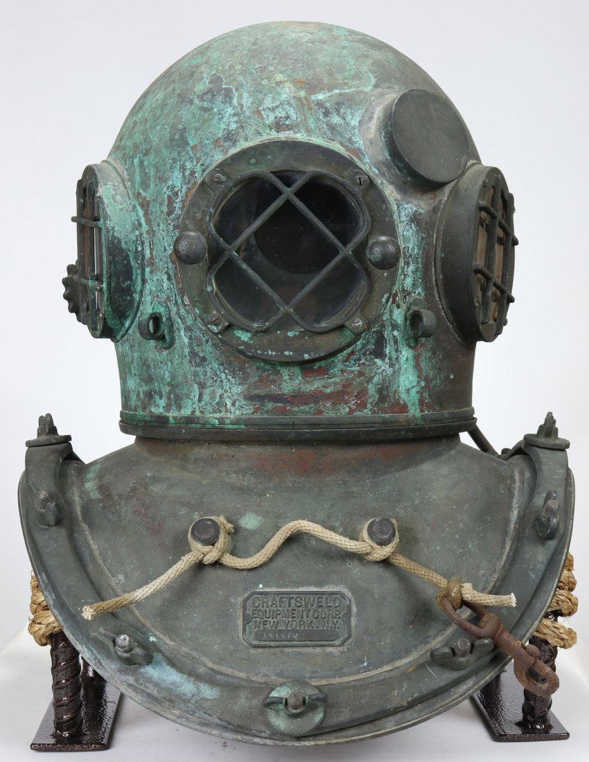 Very Early Craftsweld Equipment Corp Diving Helmet 1952: Wonderful as found original Craftsweld Equipment Corporation diving helmet. This helmet along with the Schrader helmet (lot 75) were found together. Both helmets were owned & used by the Construction 