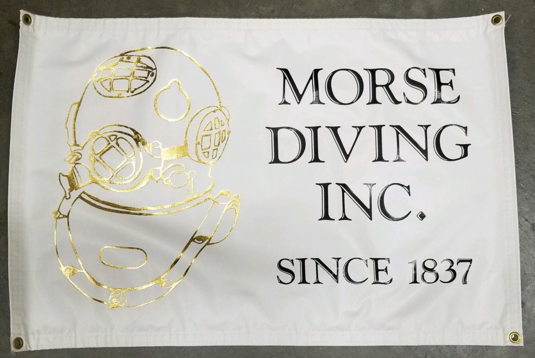 Morse Diving Inc. Diving Helmet 1837 Banner: Very nice vinyl banner used by Morse Diving Inc while they were in Rockland, MA. This banner is single sided and measures 35.5 inches wide and 23.5 inches tall. Excellent condition with heavy metal gr