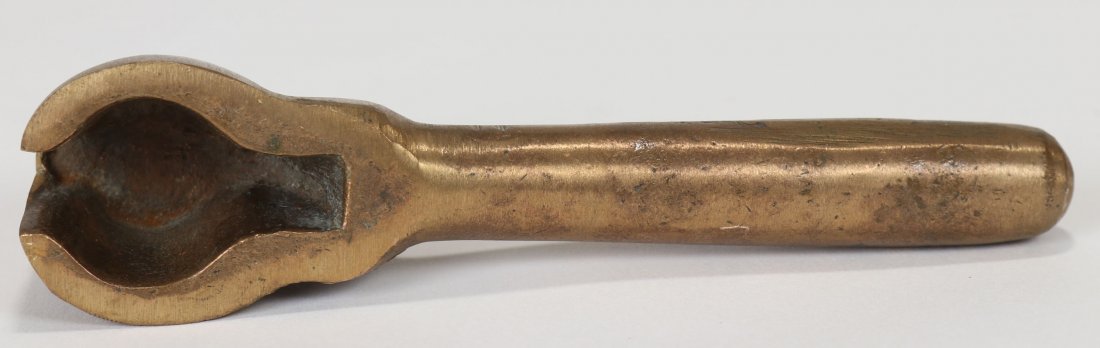Antique Diving Helmet Navy Neck Flange Wrench: Rarely encountered diving helmet wrench. A very similar style is found in the 1917 A.J. Morse catalog and is referred to as a helmet wrench for Navy neck flanges. Wrench measures 6.25 inches long, mad