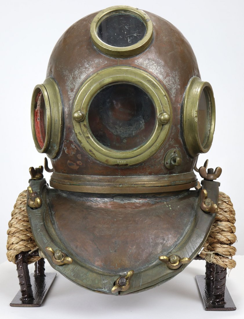 Siebe Gorman 4 Light 12 Bolt Custom Diving Helmet: Classic design and historical importance in diving are hallmarks of helmets made by Siebe Gorman. This unique helmet has no ID plate to help date when it was made. The four brails are stamped Siebe Go