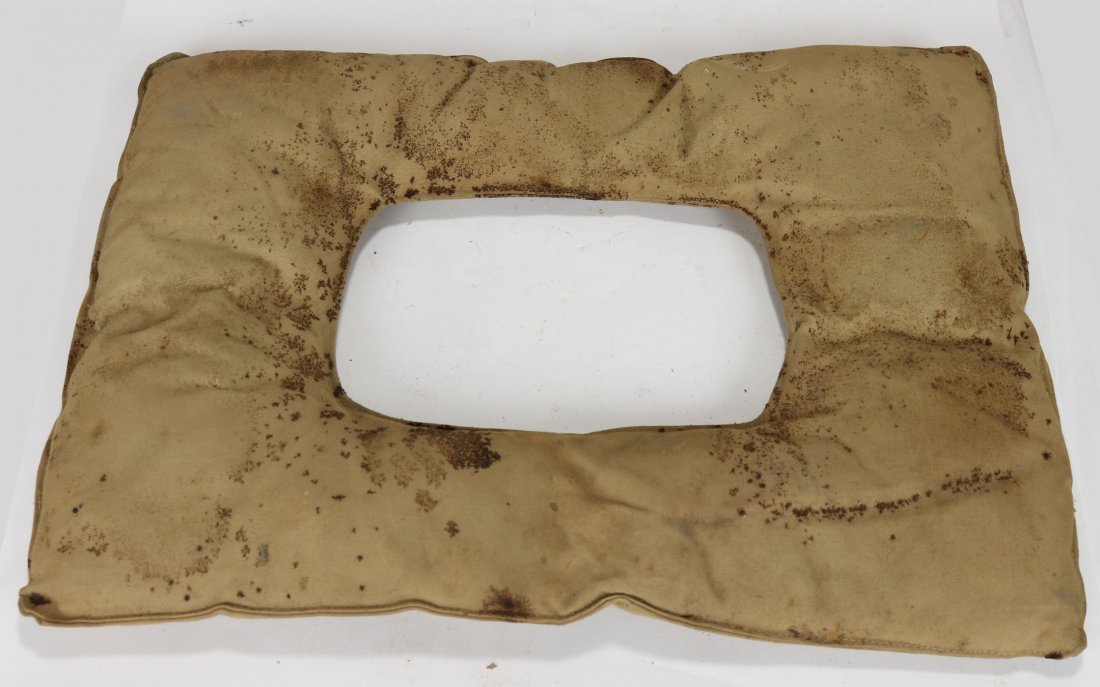 Vintage Canvas Diving Helmet Cushion / Shoulder Pad: Very old diving helmet cushion or shoulder pad (divers had many names for these). These were put on top of the divers shoulders under the dive dress to prevent discomfort from the helmet. Pad exhibits