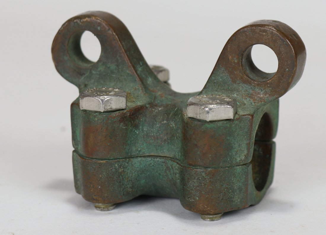 Old Diving Helmet Communication Cable Clamp: Very seldom found piece of equipment used by military and commercial divers. This is a brass communications cable clamp. This part with the addition of a hook would allow the diver to secure the telep