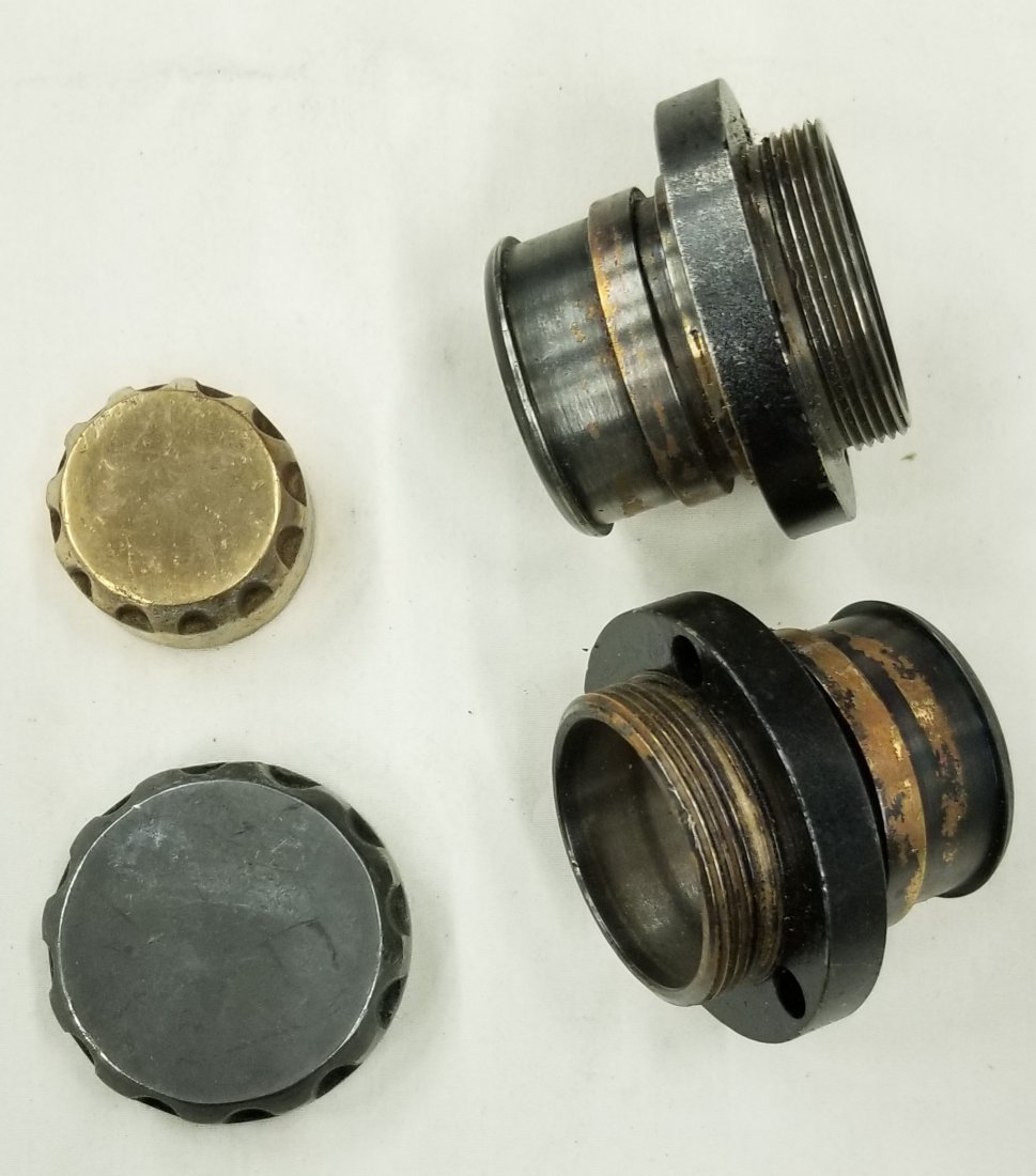 Mark 12 Diving Helmet Fittings and Caps: Lot of 4 items related to Mark V diving helmet. Two caps and two male threaded fittings. All items are in good used condition.