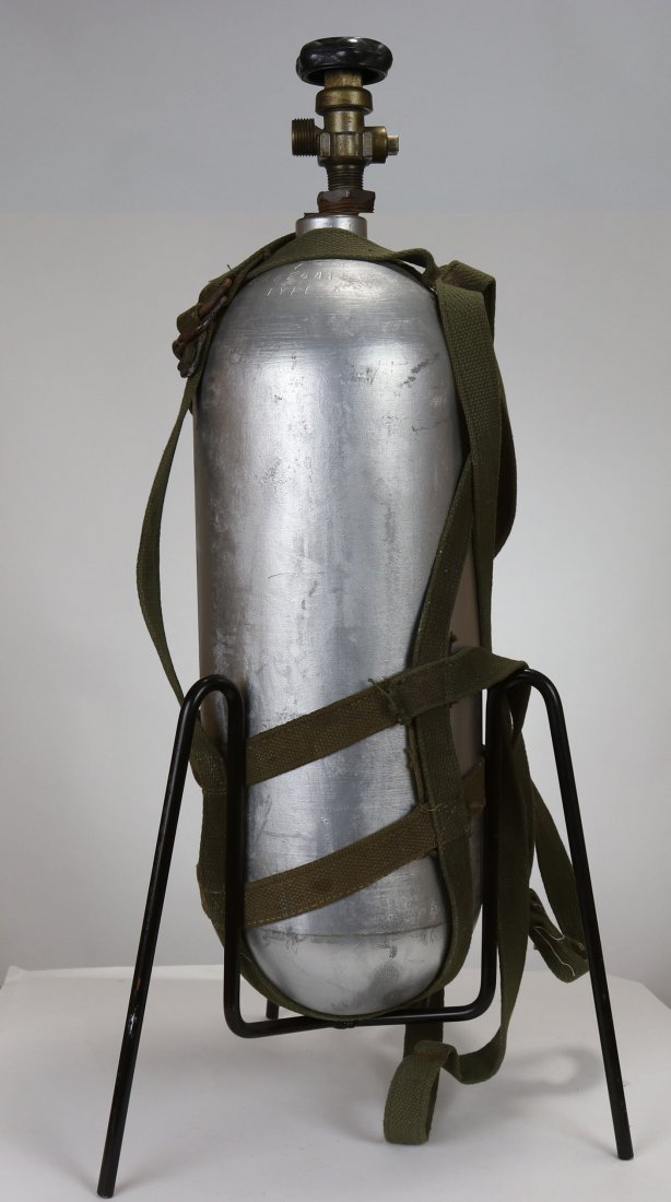 Scuba Tank USN Stamped 7-42 Military Surplus Cylinder: Vintage Scuba tank, circa early 1950s, single WK&CO scuba tank with olive drab webbing harness, stamped USN, dated 7-42, TYPE A. A WWII military surplus cylinder converted for diving. The Kidde Model