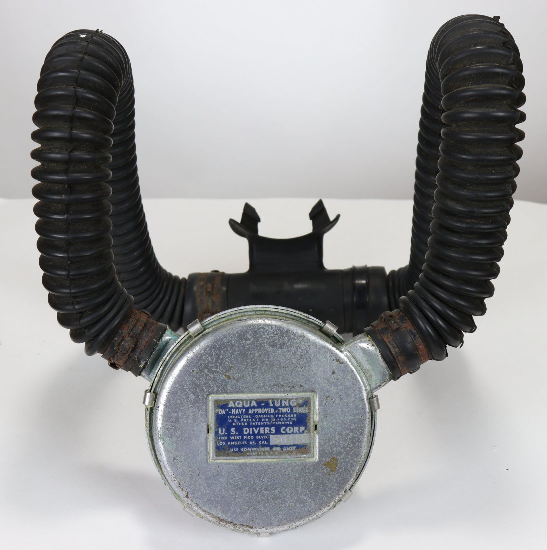 Aqua-Lung DA Navy 2 Stage Regulator 1956-58: Nice Aqua-Lung DA Navy Approved two stage regulator. The ID plate allows us to date this piece to the 1956 to 1958 time period. This early regulator was used by US Navy SEAL units as well as Navy salv