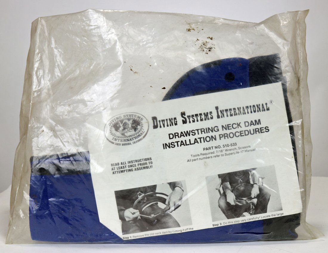 Diving Systems Kirby Morgan Drawstring Neck Dam NOS: New old stock (NOS) Diving Systems International / Kirby Morgan drawstring neck dam, part no 510-533. Age unknown, sealed in original bag.