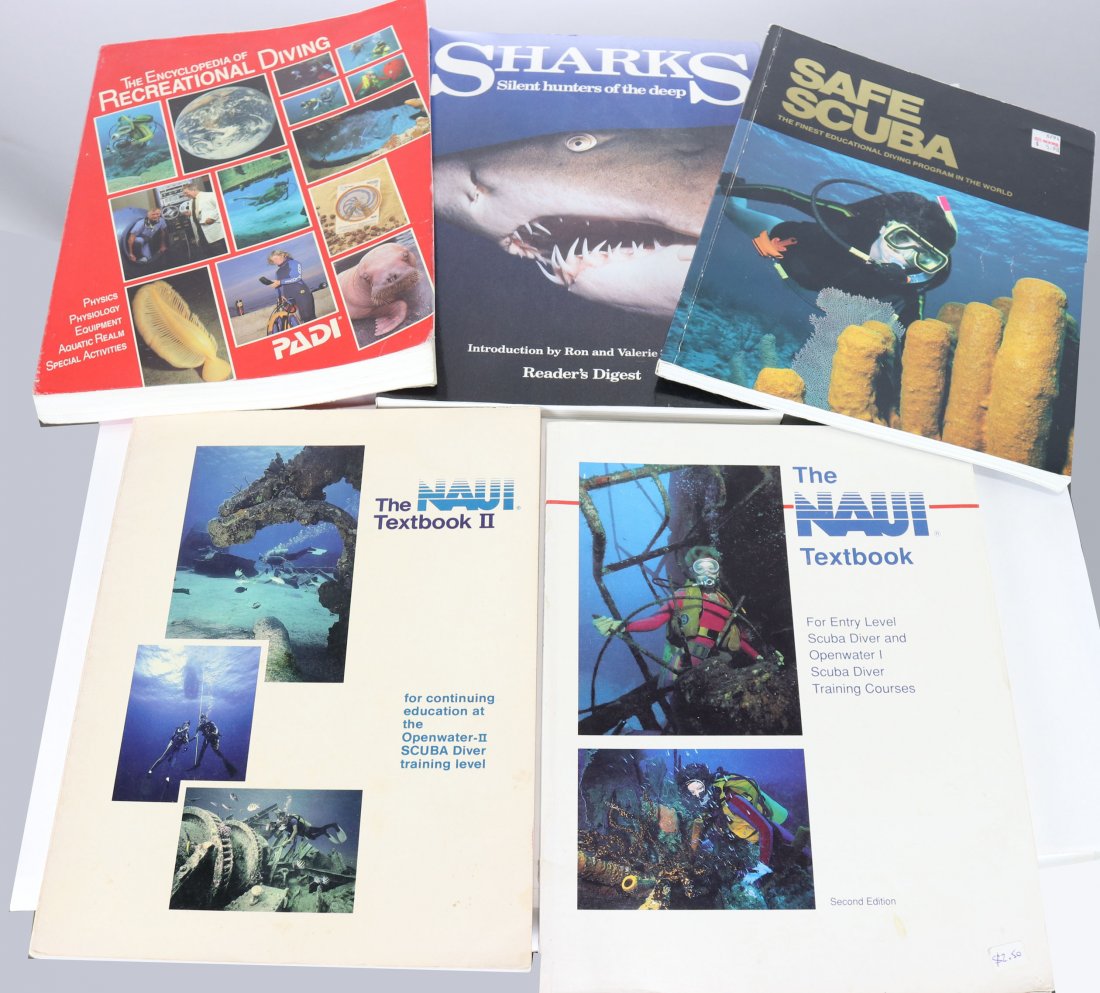 2 NAUI Textbooks, PADI Book, Shark Reference, SCUBA: Grouping of 5 books. Titles are NAUI Textbook for Entry Level SCUBA Diver training course, NAUI Textbook II for continuing education at Openwater II SCUBA diver, The Encyclopedia of Recreational Divin