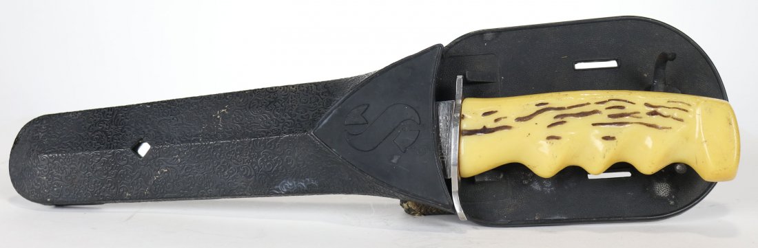 Vintage SCUBAPRO Sea Wolf Knife 1970s: One of THE coolest dive knives to ever come on the market. Vintage SCUBAPRO Italian-made divers knife with 8-inch blade, circa 1970's. Based on Sea Wolf knife. Serial number AO2750 stamped in the blad