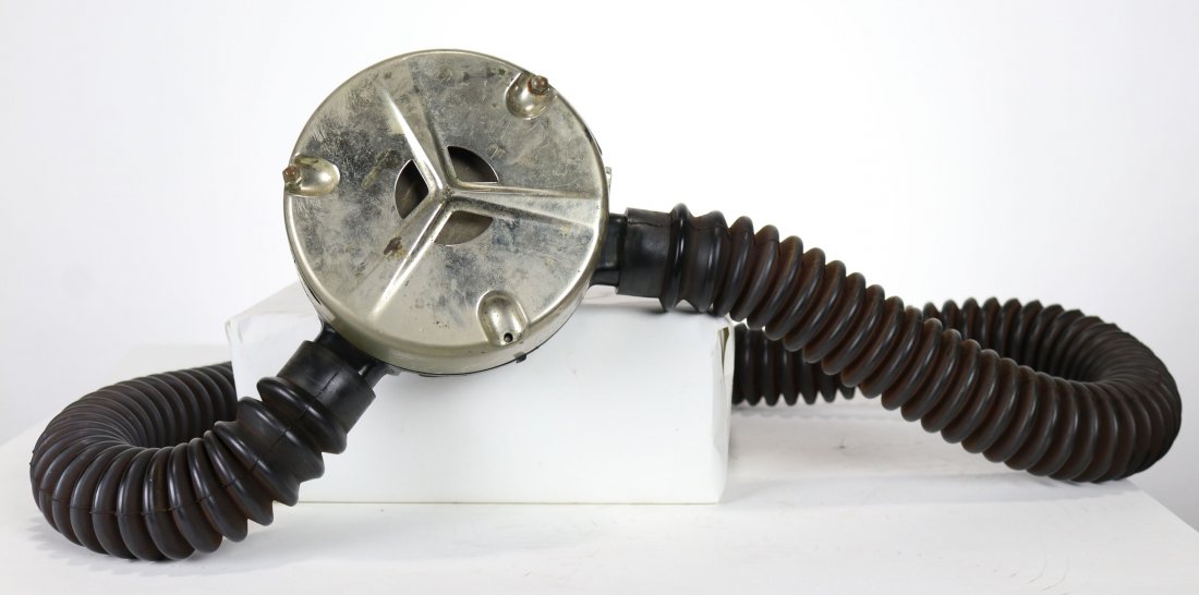 DIVAIR Model E 1955-56 Double Hose Regulator: Circa 1955-56 double hose regulator made by L.C. Arpin Company. This DIVAIR appears to be a model E. Currently the regulator body has 3 loose screws. Condition of the hose and mouthpiece can be seen i