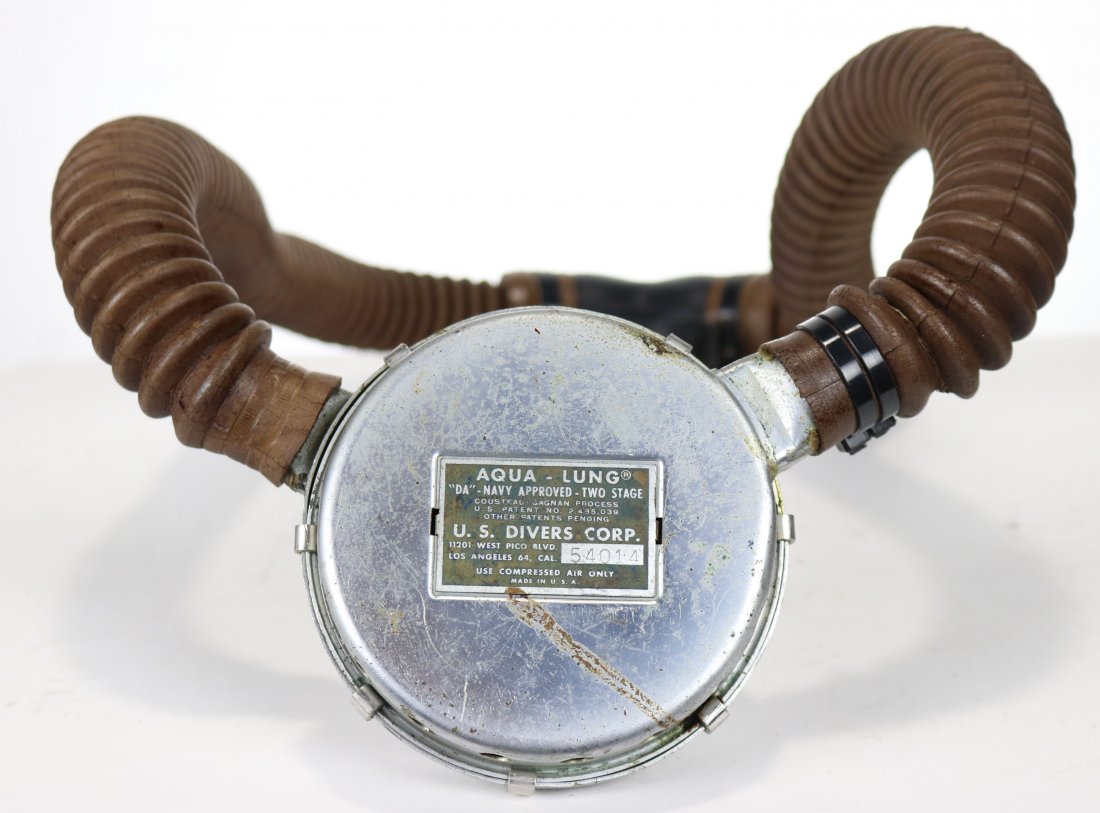 Aqua-Lung DA Navy Approved 2 Stage Regulator: Double hose regulator made by US Divers. This is a Aqua-Lung DA Navy Approved Two Stage model. Features a blue label with West Pico Blvd address. Dates to the 1955-1960 time period. Condition of the r