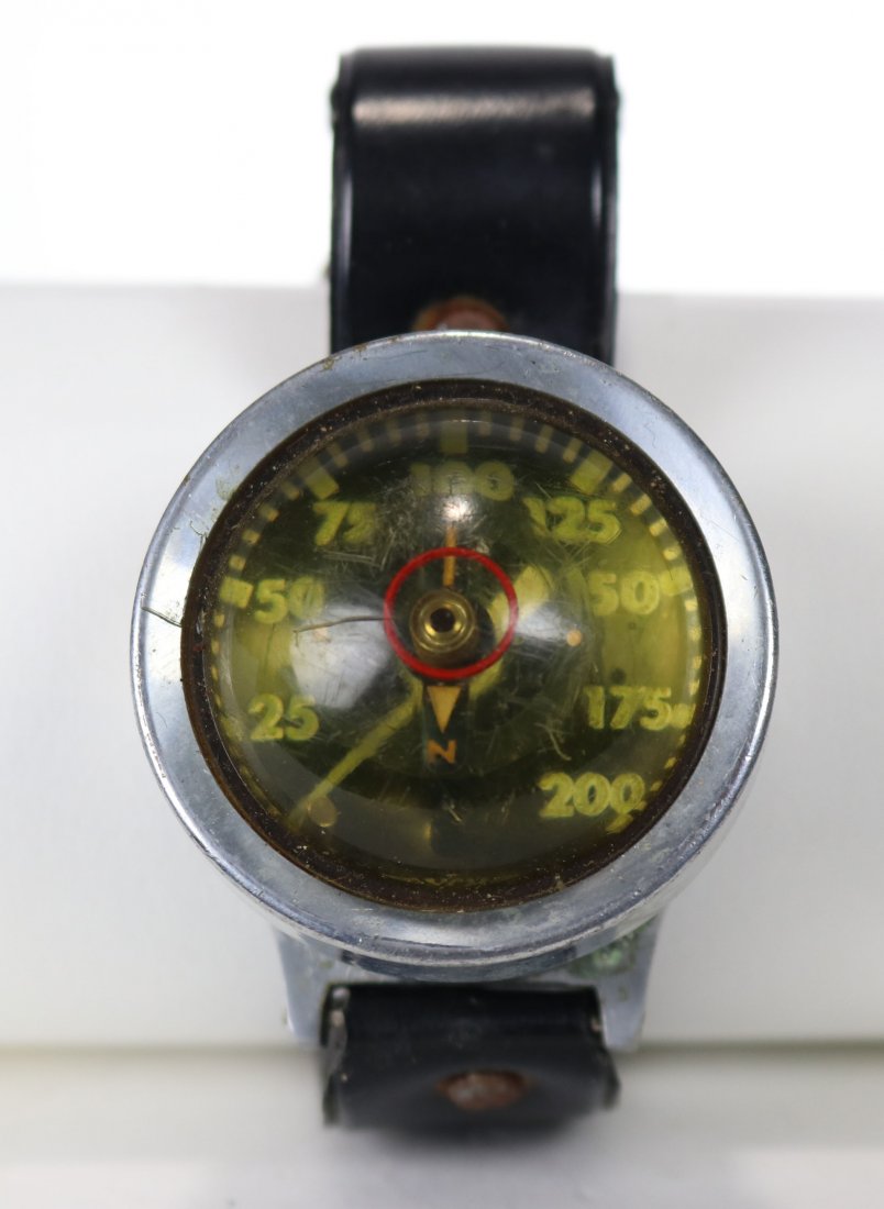 Vintage YCM 200 Feet Depth Gauge w/ Compass: Interesting old depth gauge made by YCM. 200 feet depth with compass in the center, which still functions. Made in Japan on back of case. Strap stamped Japan, very stiff condition.