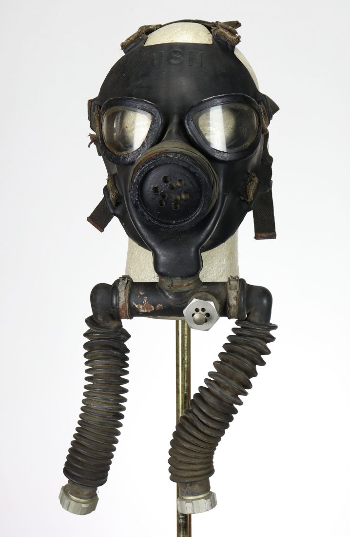 WWII US Navy Mask As Used at Pearl Harbor: World War II vintage USN mask with USN molded into the top. This is the exact type of mask adapted and used at Pearl Harbor as shown in the photo of the oil covered diver at Pearl Harbor. The mask was